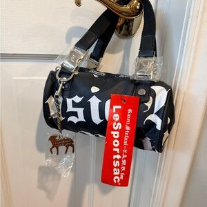 Brand New LeSportsac LAMB Gwen Stefani - Tattoo Black and White Mini Barrel Bag